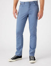 WRANGLER TEXAS SLIM MĘSKIE SPODNIE MATERIAŁOWE BLUE MIRAGE W12SEAXOD 112145793